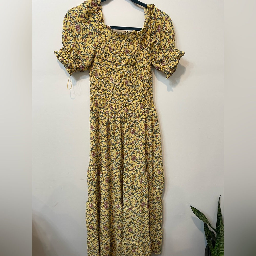 Woman’s yellow dress
